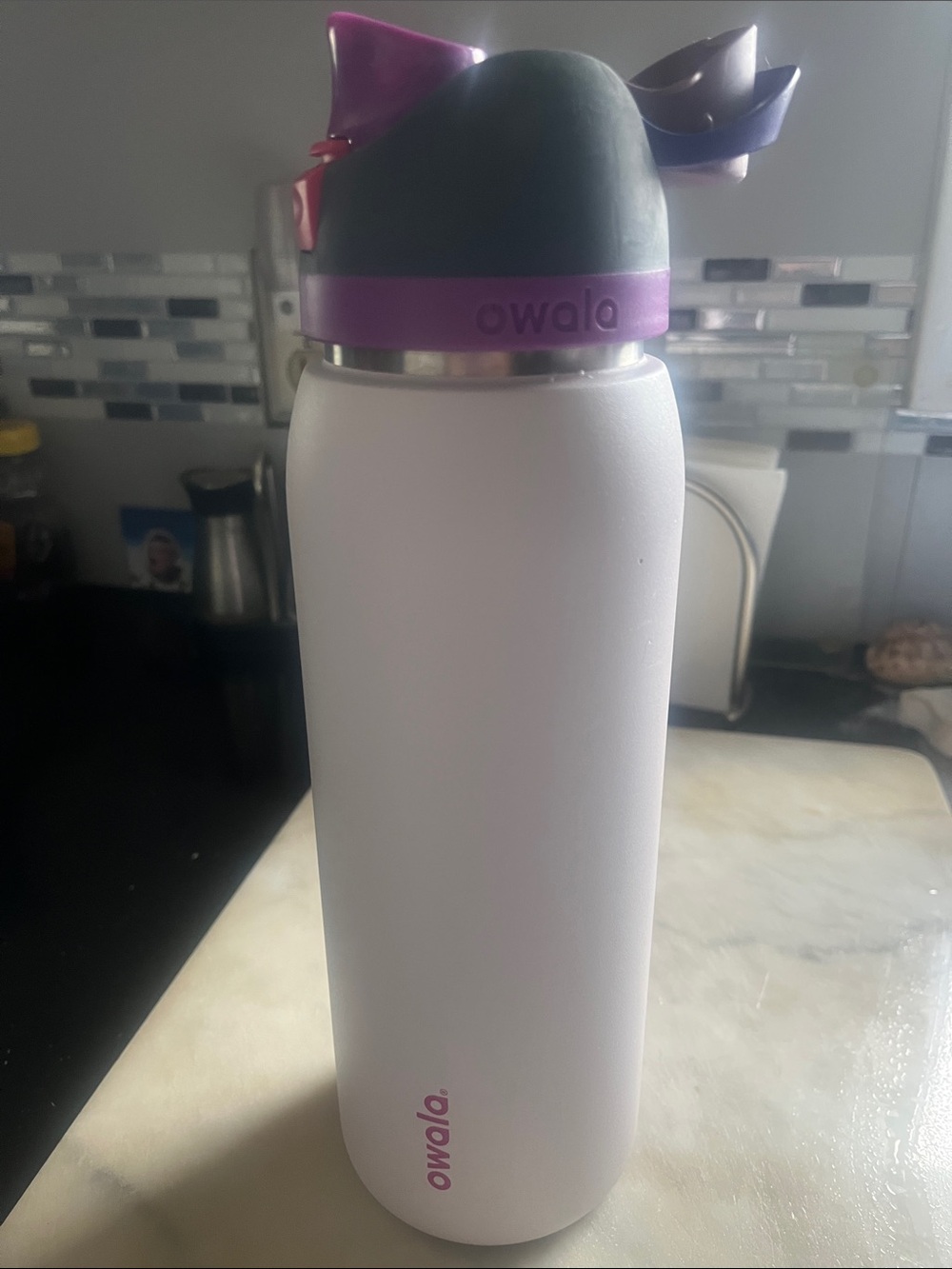 Owala White Stainless Water Bottle with Purple Accents